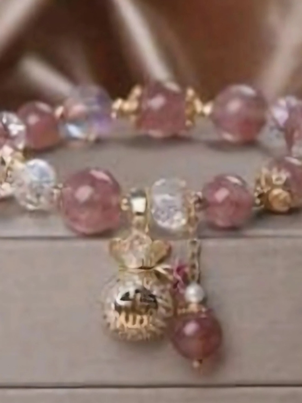 Delicate Pink Bead Charm Bracelet with Gold Accents